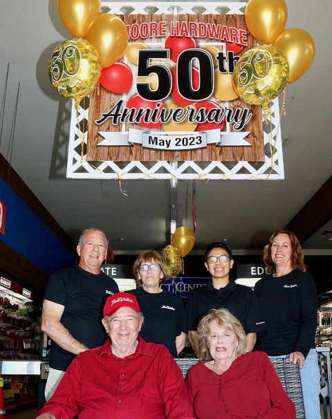 Bob and Ann Badasci with the store's employees, Jim Pedulla, Joyce Smith, Diana Torres, and Vicki Wood.